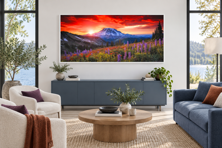 Mount Rainier wall art featuring a sunset landscape with wildflowers above a blue sideboard.
