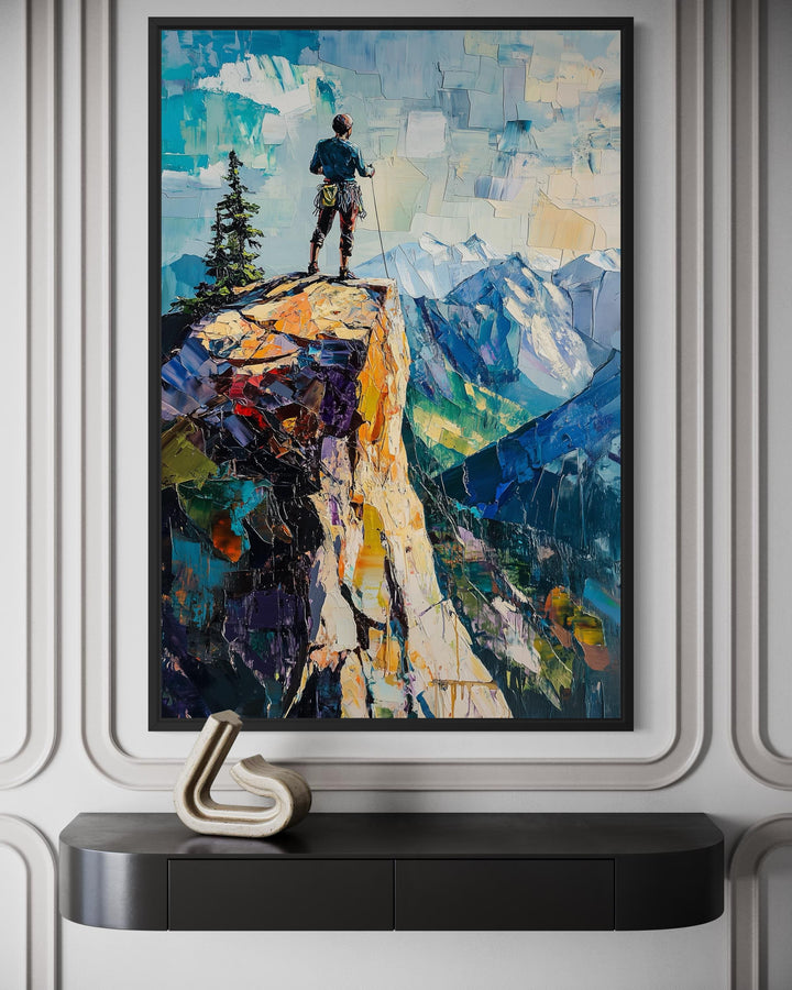 Vertical canvas print of a hiker on a cliff overlooking a mountain landscape in a textured art style.
