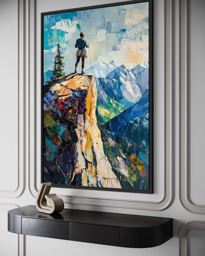 Vertical canvas print of a hiker on a cliff overlooking a mountain landscape in a textured art style.