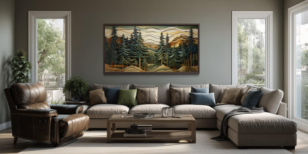 Panoramic mountain forest canvas wall art with pine trees hanging above a sofa in a rustic room.