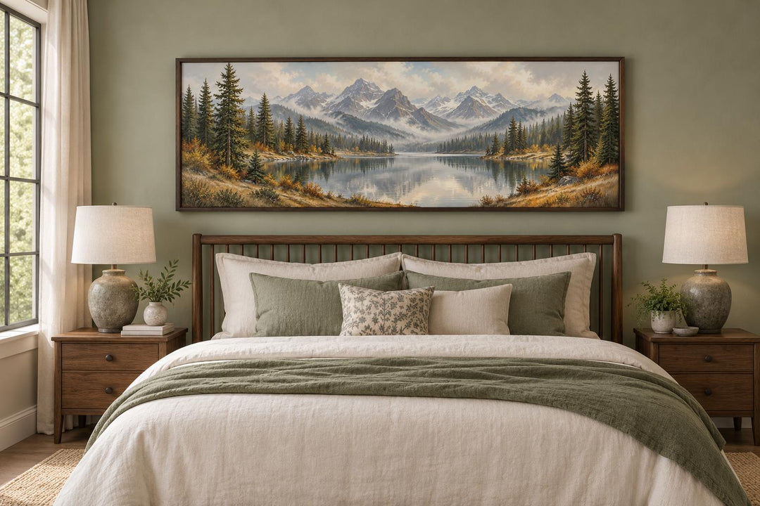Mountain Lake and Autumn Forest long horizontal canvas wall art hanging above a wooden bed frame.
