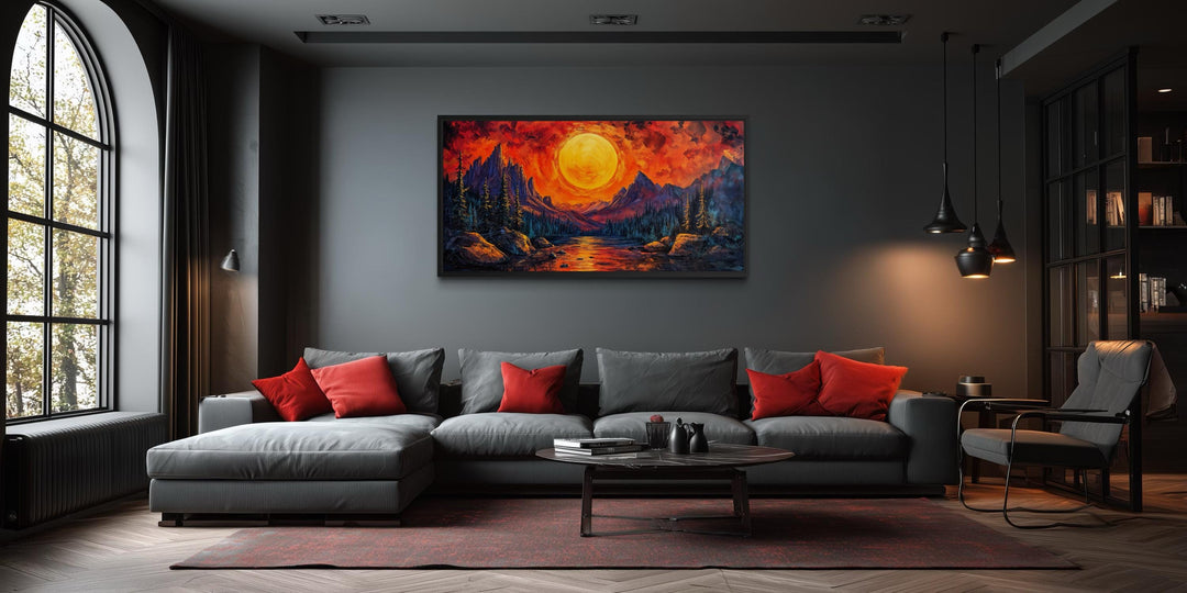 Mountain Lake Fiery Sunset Canvas Wall Art displayed in a modern living room above a gray sofa.