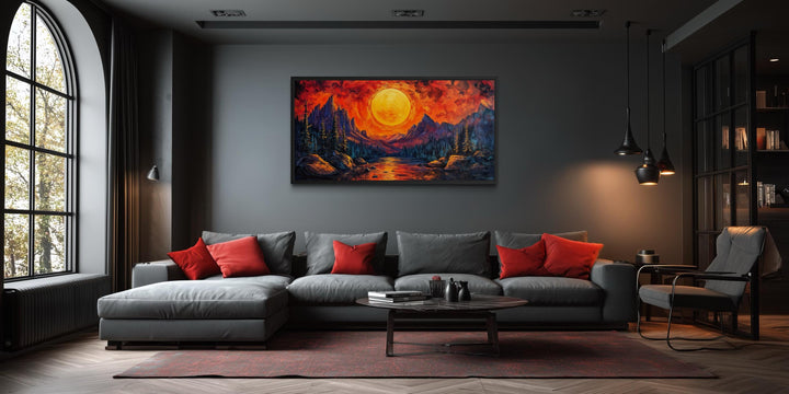 Mountain Lake Fiery Sunset Canvas Wall Art displayed in a modern living room above a gray sofa.