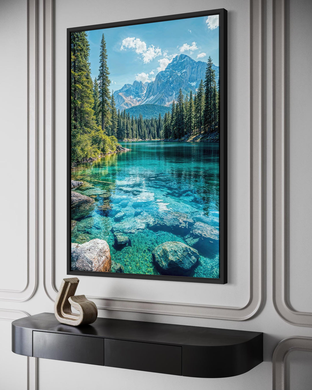 Vertical canvas wall art featuring a clear turquoise mountain lake and forest in a black frame.