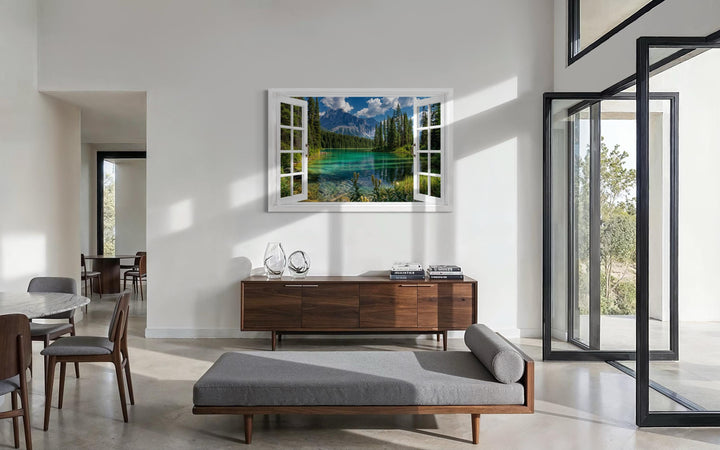 Mountain lake window view canvas wall art featuring a turquoise alpine lake and white window frame.