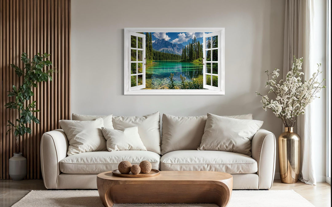 Mountain lake window view canvas wall art depicting a turquoise alpine lake in a white window frame.