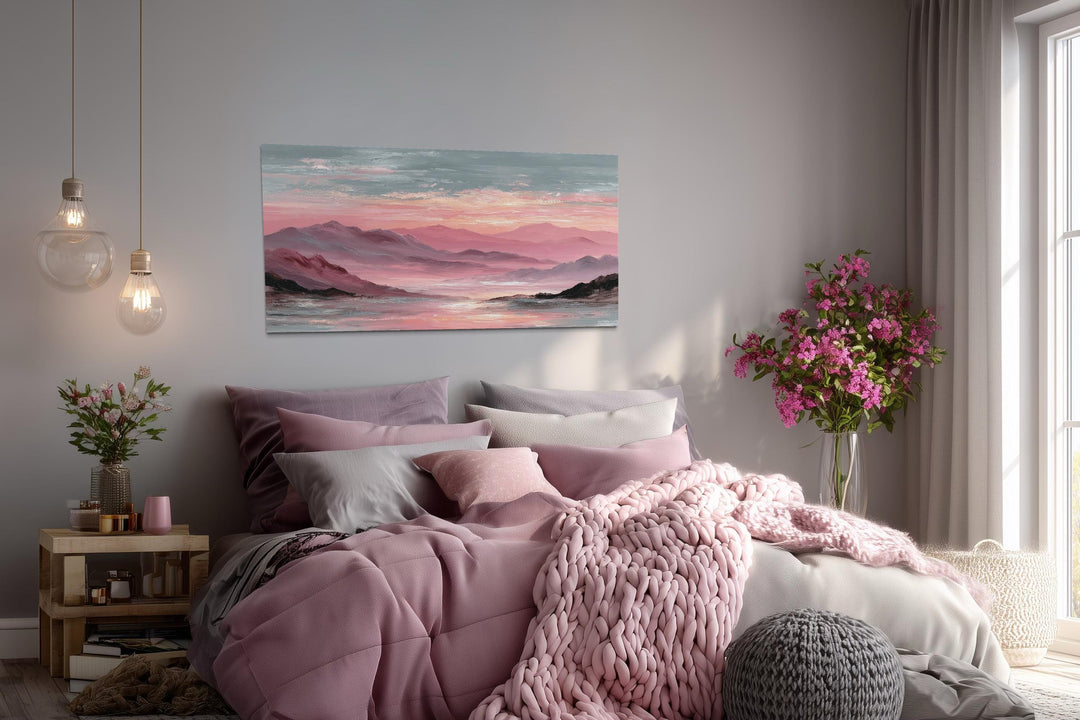 Mountain landscape wall art canvas print featuring a soft blush sunset over pink mountain peaks.