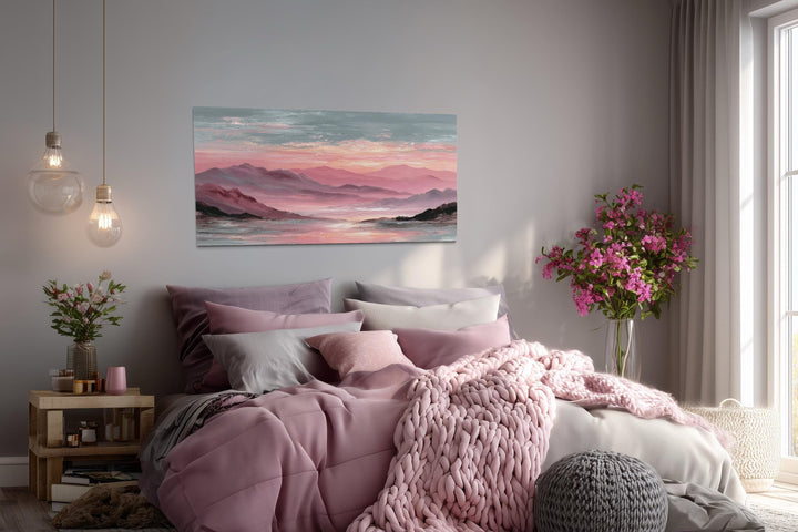 Mountain landscape wall art canvas print featuring a soft blush sunset over pink mountain peaks.