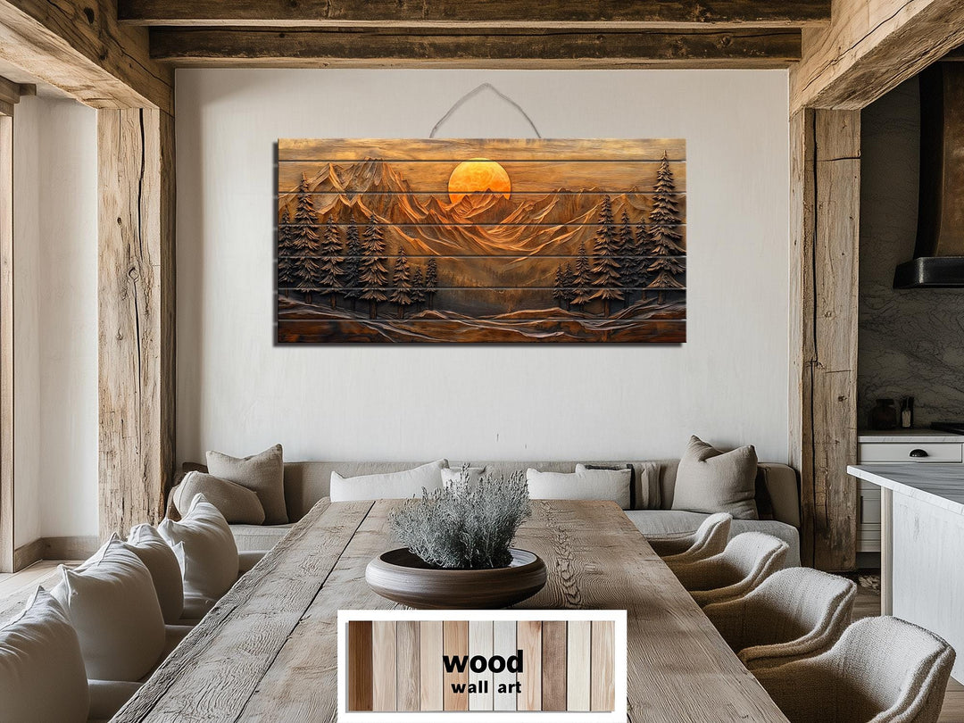 Rustic wood wall art featuring a mountain sunset and pine forest scene above a dining table.