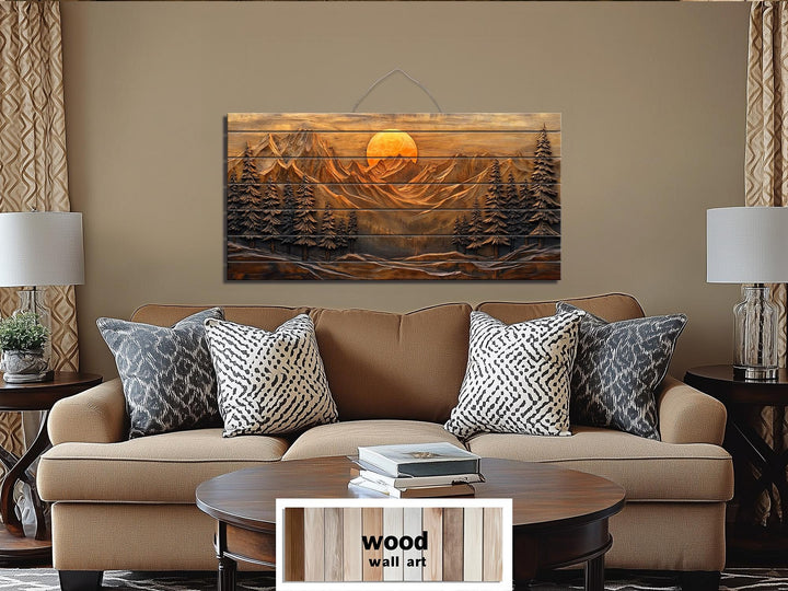 Rustic wood wall art featuring a mountain sunset and pine forest scene above a living room sofa.