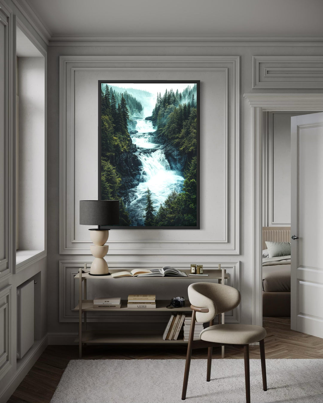 A vertical canvas print of a rushing mountain waterfall through a dense pine forest in a black frame.