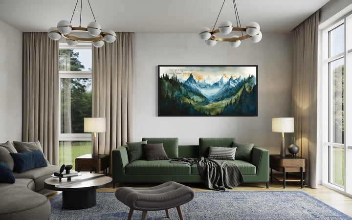 Framed mountain landscape wall art with the quote 'The mountains are calling and I must go'.