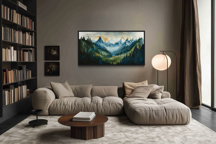 Framed mountain landscape wall art with the quote 'The mountains are calling and I must go'.