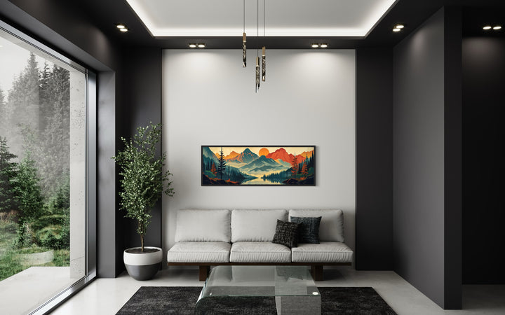 Horizontal landscape canvas wall art of a mountain, forest, and lake scene in a modern living room.