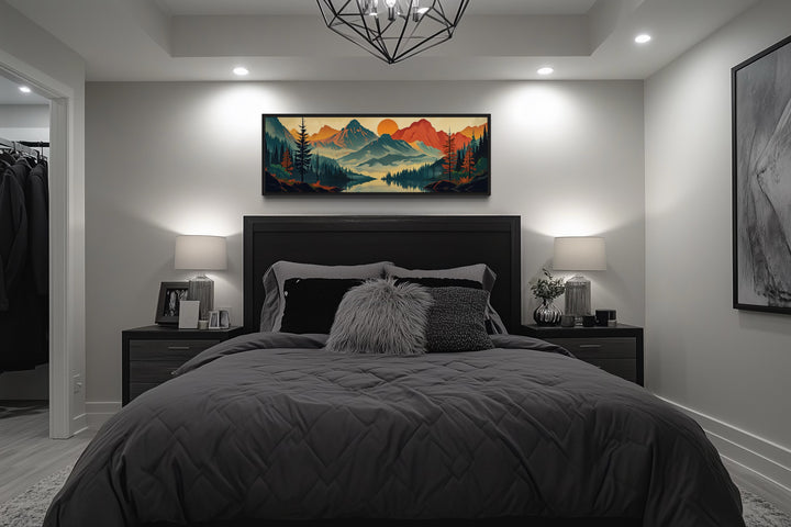 Mid-century modern horizontal canvas wall art of a mountain landscape above a bed.