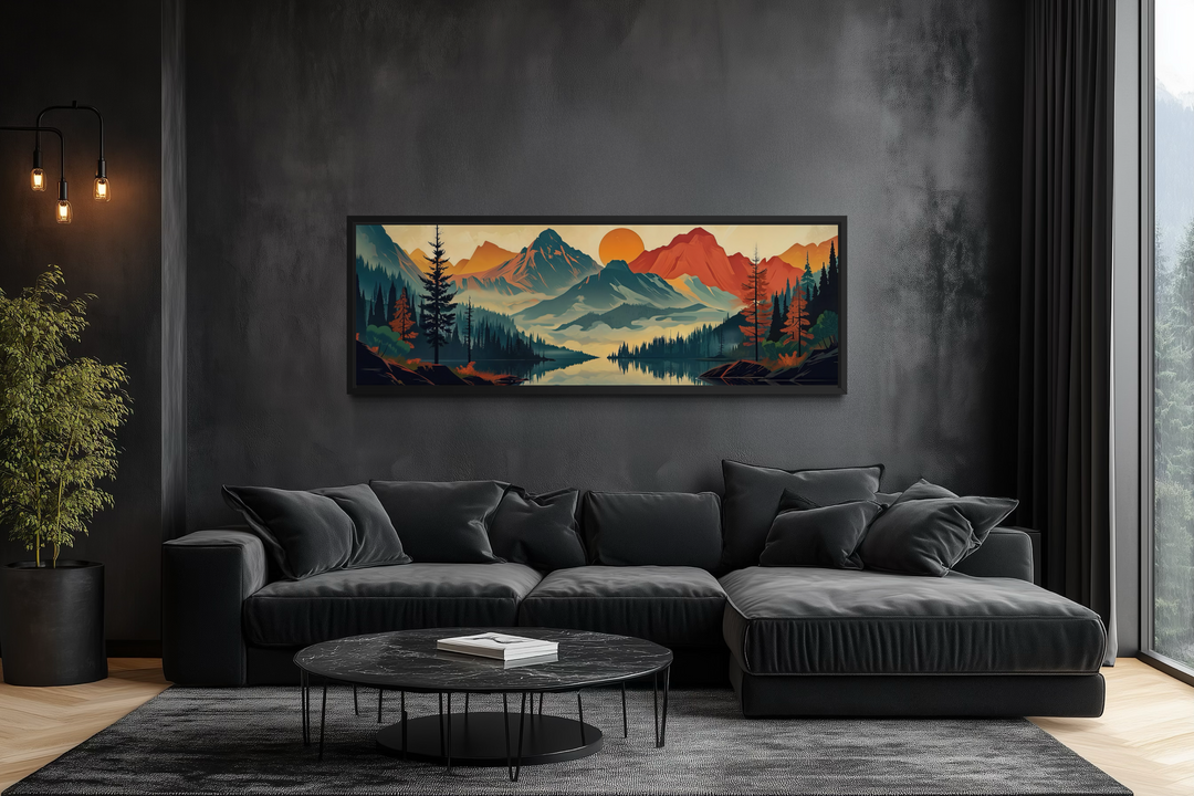 Horizontal mid-century modern canvas wall art of a mountain landscape above a black sectional sofa.