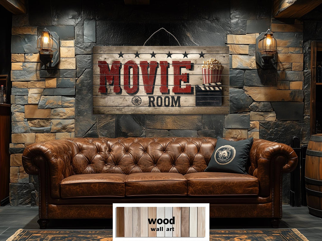 Rustic wood movie room wall art with a distressed vintage print hanging above a leather sofa.