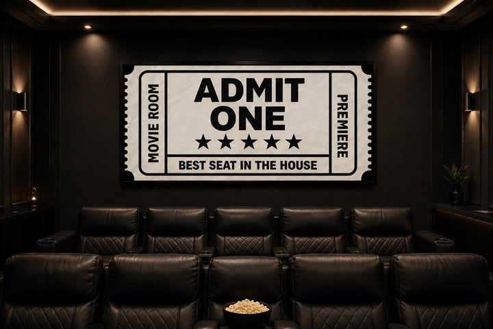 Vintage-style Admit One movie ticket canvas wall art in a black home theater room.