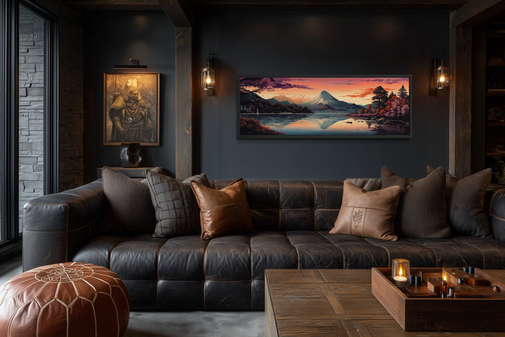 Horizontal framed canvas of Mt. Fuji and Lake Kawaguchiko in a dark, modern living room.