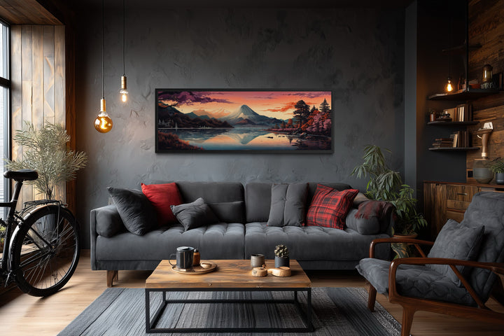 Mt. Fuji and Lake Kawaguchiko landscape horizontal framed canvas art above a dark gray sofa.