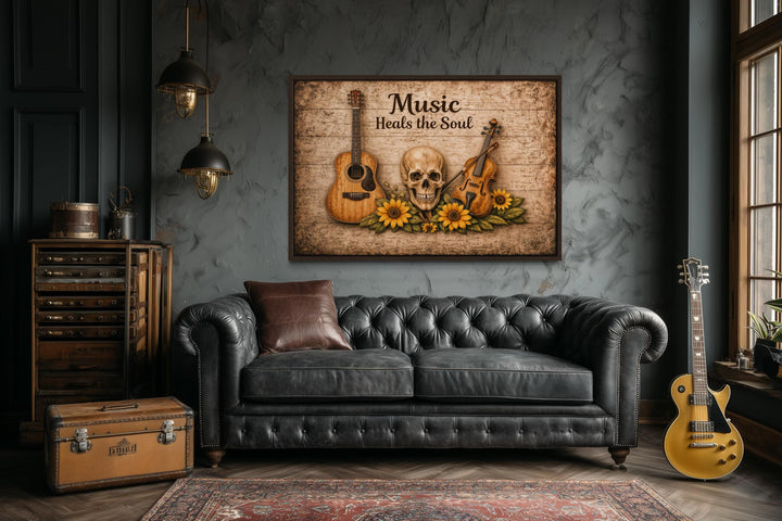 A rustic canvas wall art featuring a skull, guitar, violin, and sunflowers above a leather sofa.