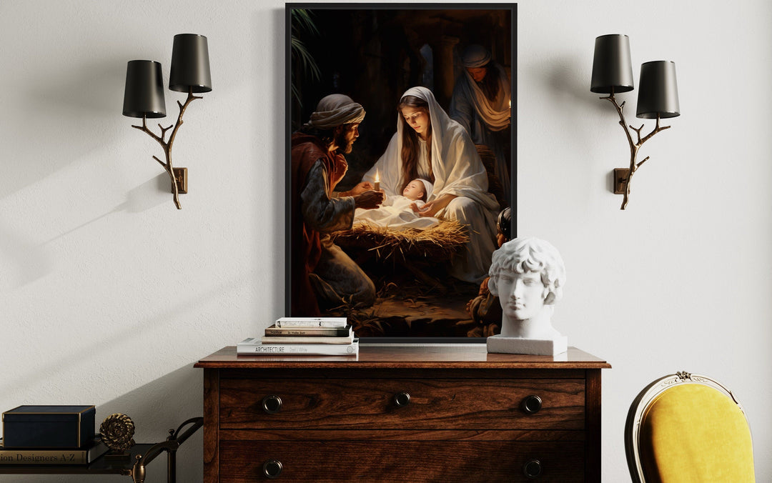 Framed canvas art of the Nativity scene with Mary, Joseph, and baby Jesus.