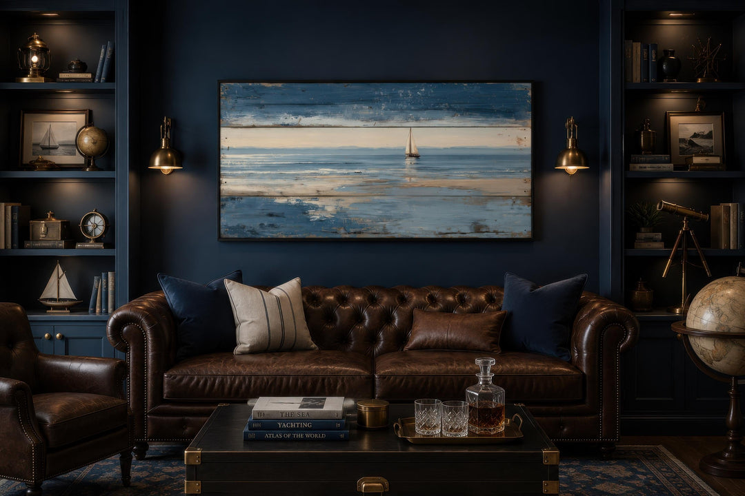 Nautical wall art of a lone sailboat on a calm ocean with a distressed wood-look canvas finish.