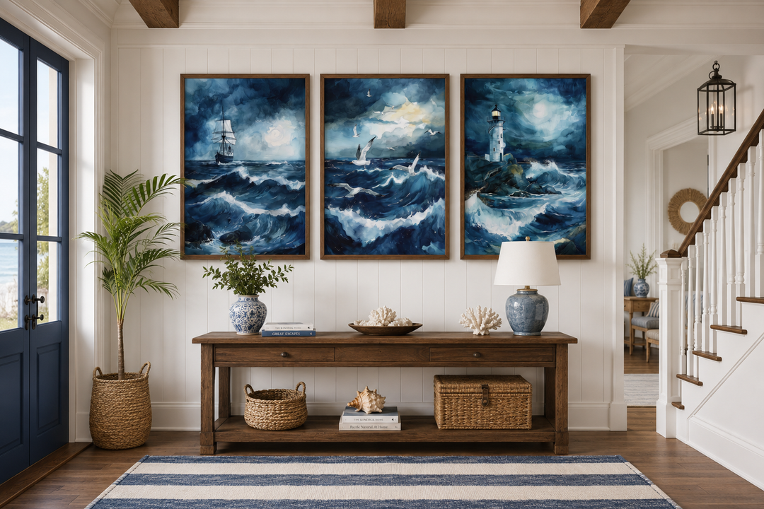 Set of 3 framed canvas prints featuring a lighthouse, sail ship, and seagulls in a stormy blue ocean.