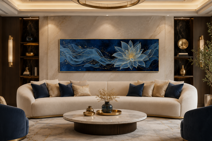 Navy blue and gold minimalist lotus flower canvas wall art above a cream sofa in a modern room.