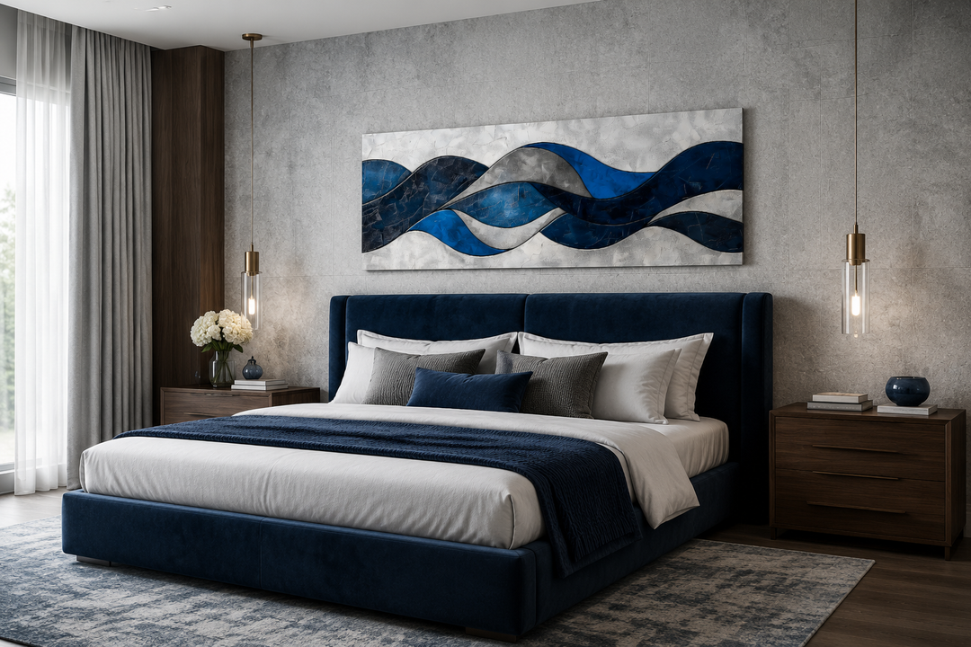 Navy blue and grey geometric abstract canvas wall art displayed above a bed in a modern bedroom.