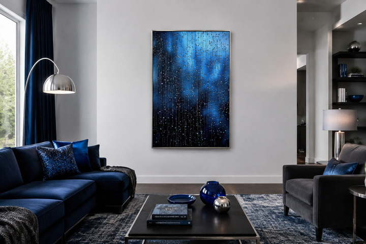 Vertical framed canvas wall art featuring cascading navy blue rain drops in a modern living room.