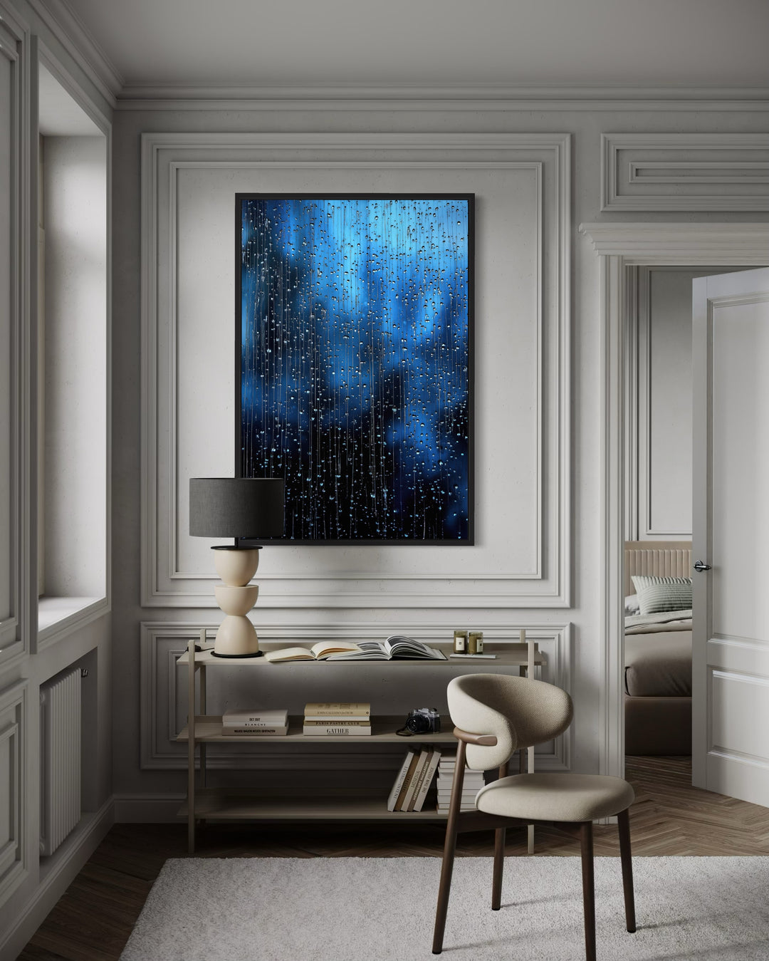 Vertical framed canvas wall art featuring cascading navy blue rain drops in a modern room.