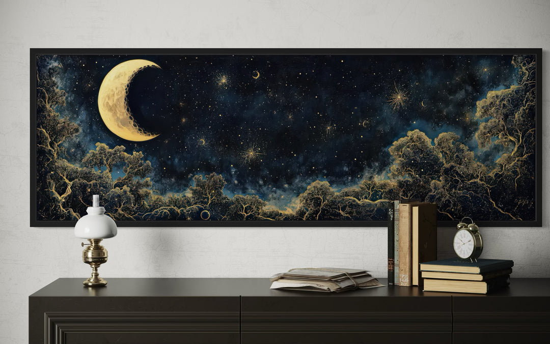 Navy blue and gold moon crescent long horizontal wall art above a dark wood dresser.