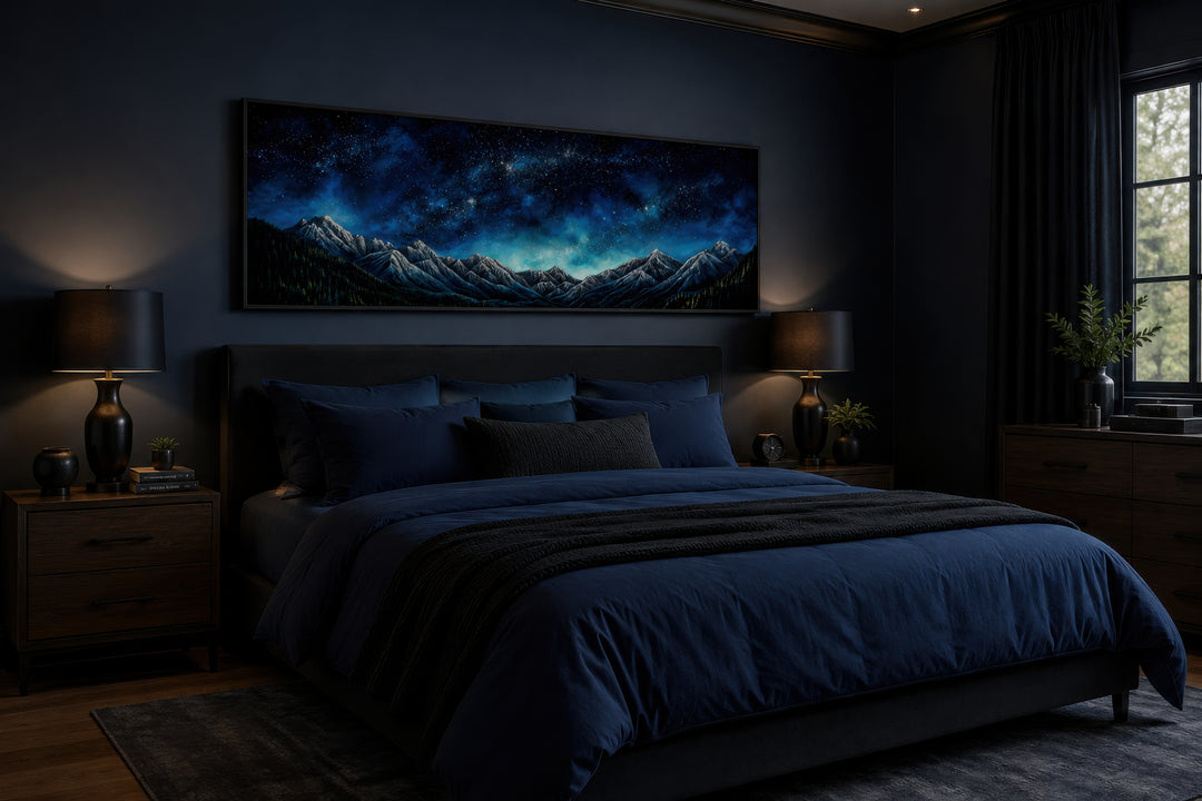 Horizontal framed canvas wall art of a navy blue starry night sky over mountain peaks.