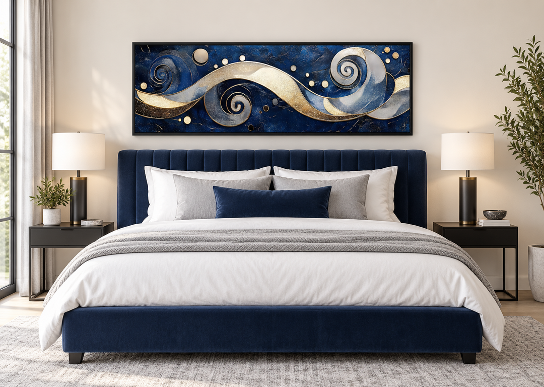 Navy and gold abstract swirl canvas art above a blue velvet bed in a modern bedroom.