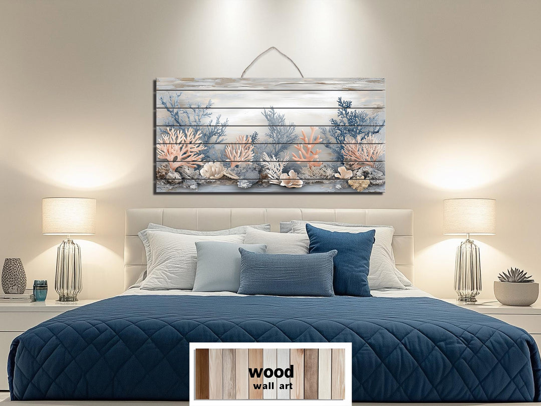 Horizontal wood wall art featuring coral in beige, blue, and peach tones above a bed.