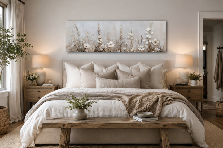 Neutral wildflower canvas print in a beige bedroom, featuring delicate floral botanical wall art.