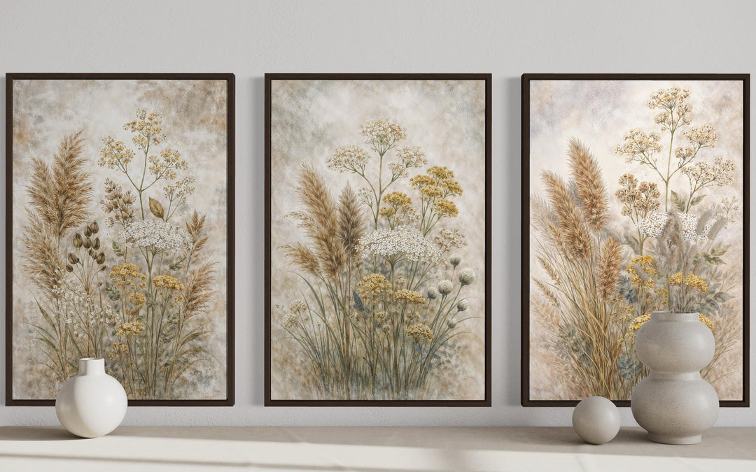 Set of three botanical canvas prints featuring neutral wildflowers in beige and earth tones.