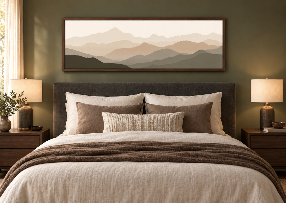 Panoramic minimalist mountain landscape wall art in neutral beige and brown above a bed.