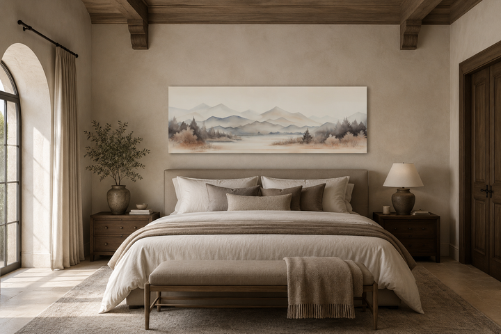 Long narrow framed canvas wall art featuring a neutral beige watercolor mountain and lake landscape.