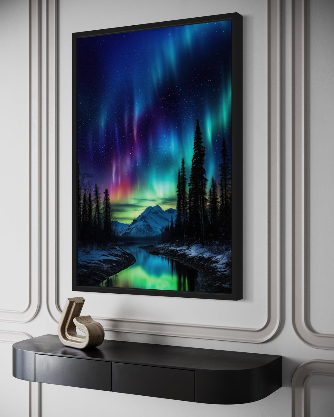 Northern Lights Aurora Borealis framed canvas wall art above a black console table.