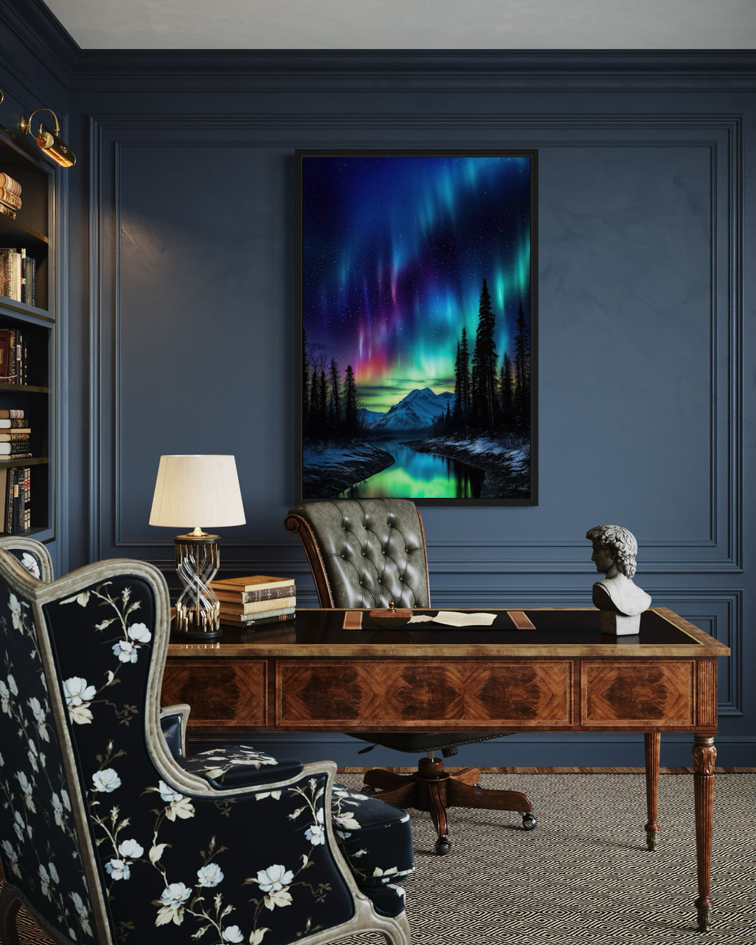 Northern Lights Aurora Borealis framed canvas wall art hanging above a desk in a dark blue office.