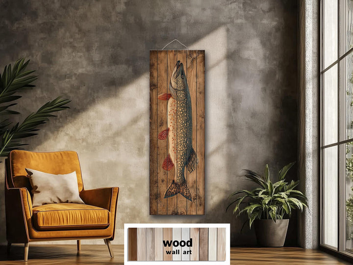Vertical distressed wood wall art featuring a detailed northern pike illustration in a rustic room.