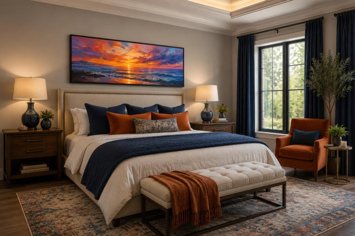 Ocean Sunset Wall Art above a bed, featuring a fiery purple and orange sky over a dark sea.