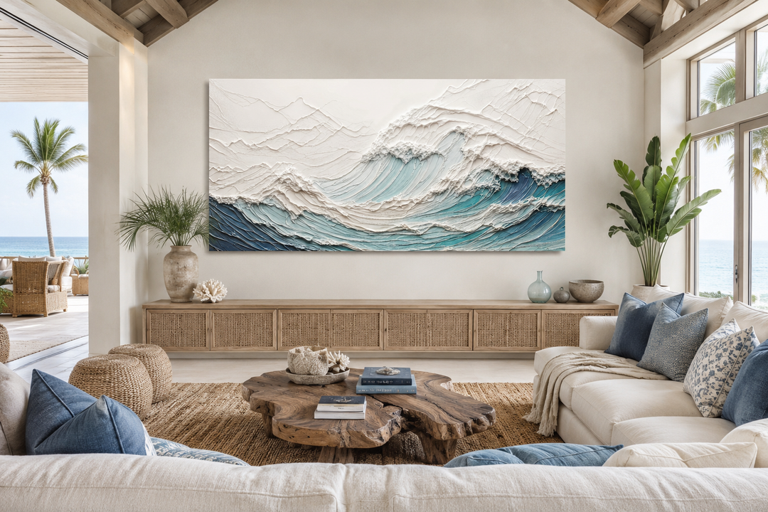 Large 3D illusion teal ocean wave canvas art above a wooden console in a coastal living room.