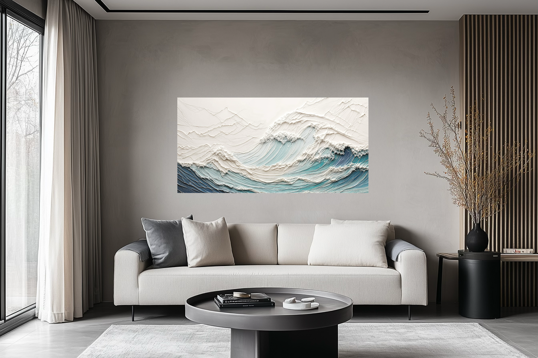 A modern teal ocean wave canvas with a 3D illusion hangs above a neutral sofa in a minimalist room.