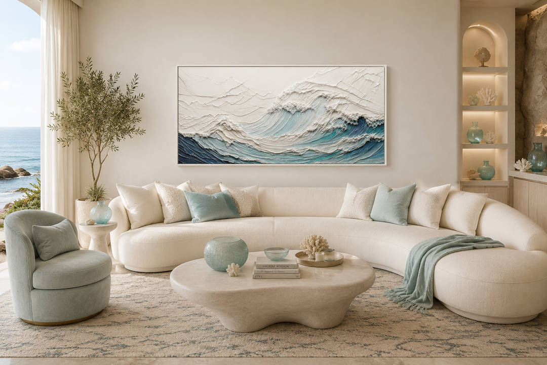 Textured 3D teal ocean wave wall art canvas above a curved white sofa in a coastal living room.