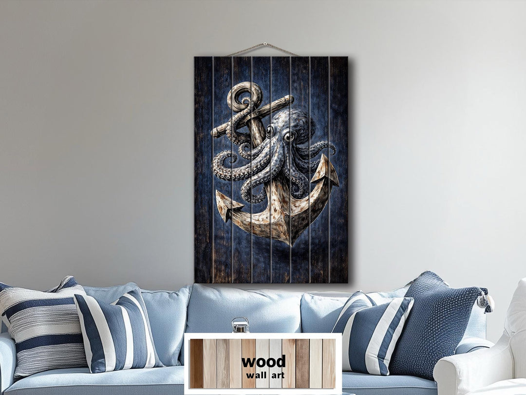 Octopus and anchor nautical wall art printed on vertical distressed wood planks above a blue sofa.