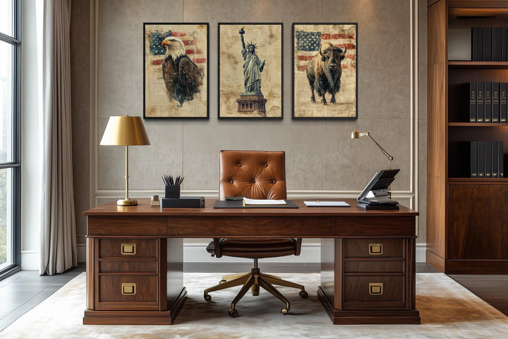 Set of 3 American wall art prints featuring a bald eagle, Statue of Liberty, and bison in an office.