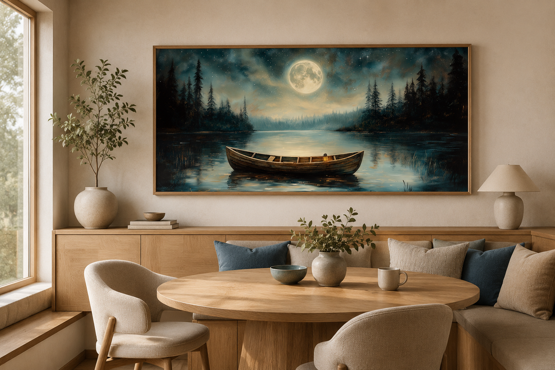 Framed canvas wall art of a wooden boat on a calm lake under a full moon in a cozy dining room.